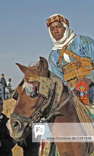 Tunesien  Douz Oasis Bereich  Berber Fahrer