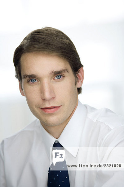 Young businessman  looking at camera  portrait