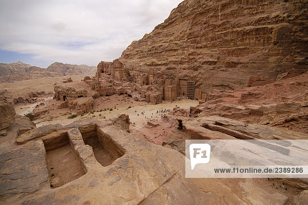 High angle view of tourists at archeological site  Petra  Wadi Musa  Jordan
