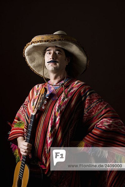 Stereotypischer Mexikaner mit Gitarre