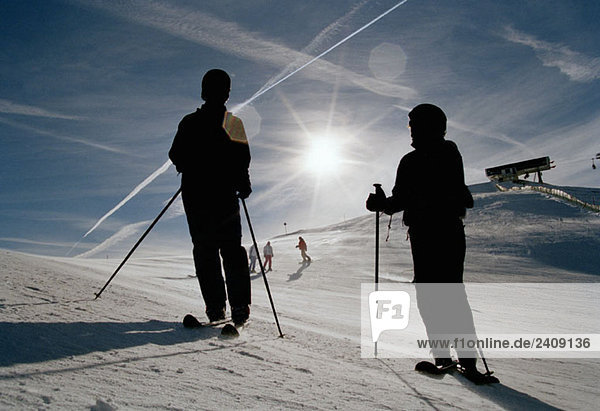 Skiers on a ski slope