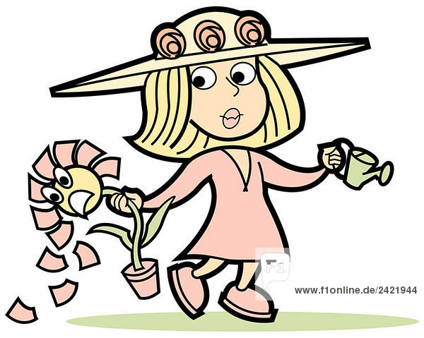 Girl holding potted plant