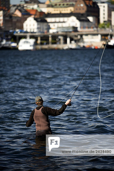 Man fishing in the water