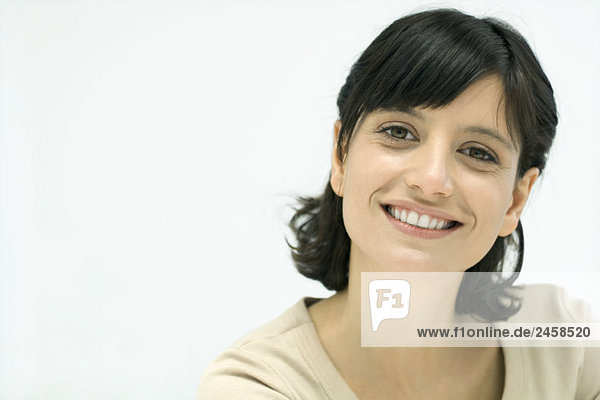 Woman smiling at camera  portrait