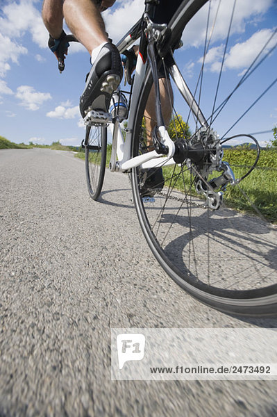 Close-up view of a cyclist pedaling