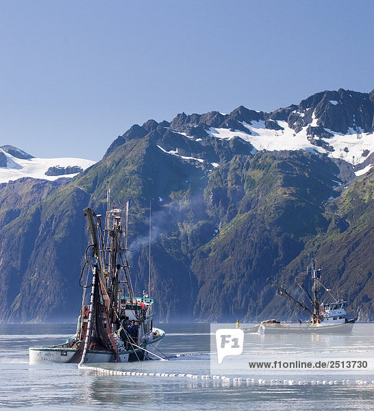 Commercial fishing boat *Malamute Kid* seining for silver salmon Port Valdez Prince William Sound Alaska