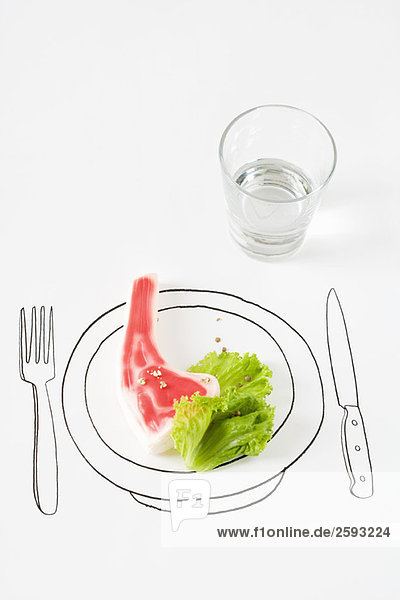 Plastiksteak und Salat auf Tellerzeichnung