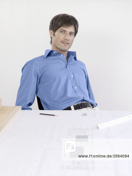 An architect sitting at his desk