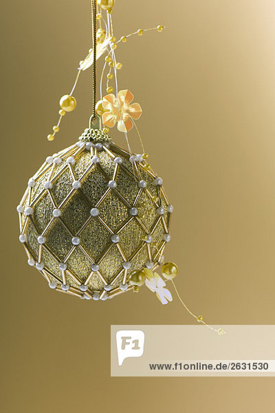 Ornate gold Christmas tree ornament