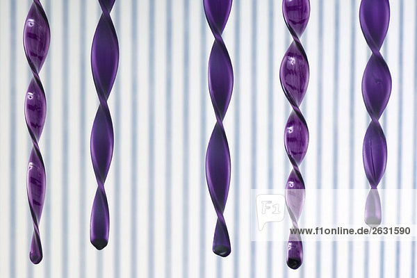 Five purple glass icicles