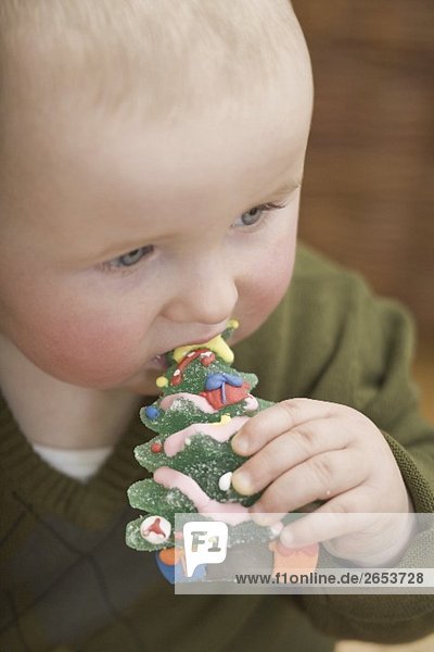 Baby eating jelly Christmas tree