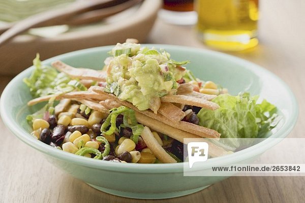 Lettuce  beans  sweetcorn  tortilla strips and guacamole