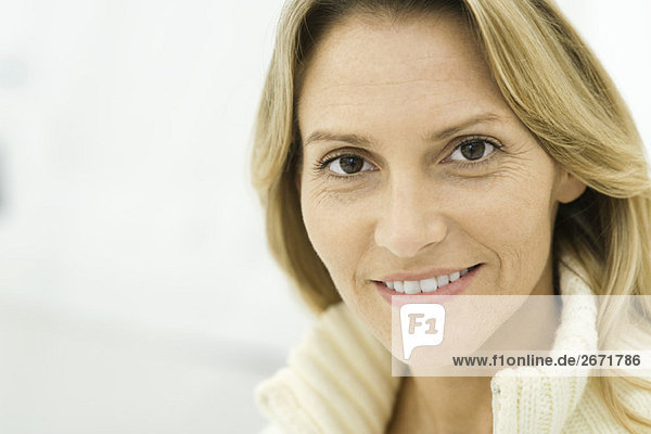 Woman smiling at camera  portrait