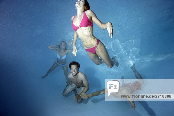 Group swimming underwater