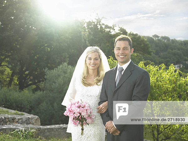 Bride and groom in sunshine
