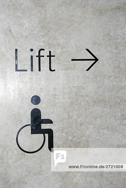 Sign Lift and symbol with wheelchair for disabled people