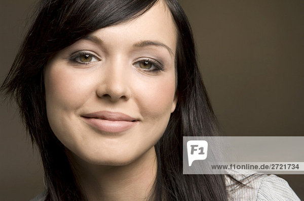 Young woman smiling  portrait  close-up