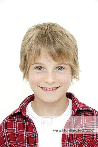 Boy (10-11) smiling  portrait  close-up
