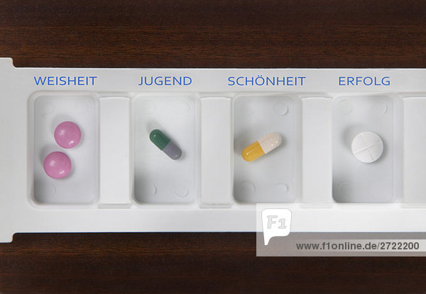 Pills inside pill box  overhead view