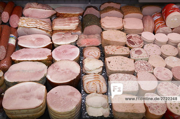 Various sausages display in supermarket  elevated view