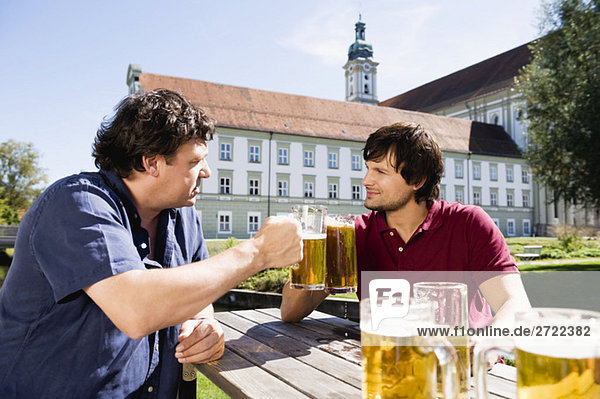 Upper   Two men in beer garden
