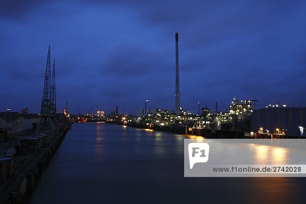 Harbor lit up at night  Hamburg  Germany