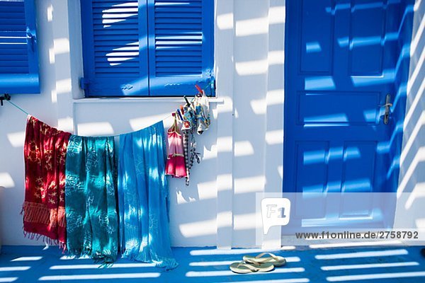 Beachwear on clothes line Greece.