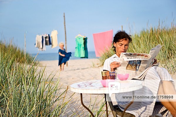 Mother and daughter on the beach Oland Sweden.