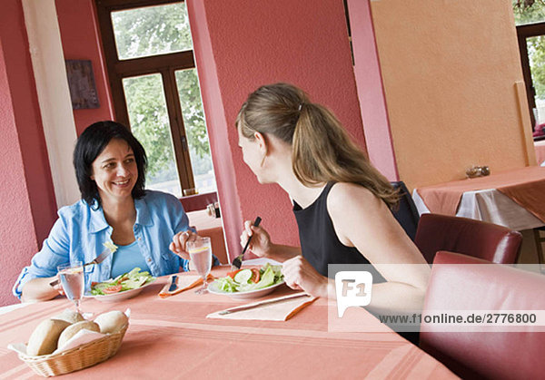 Women talking over a meal