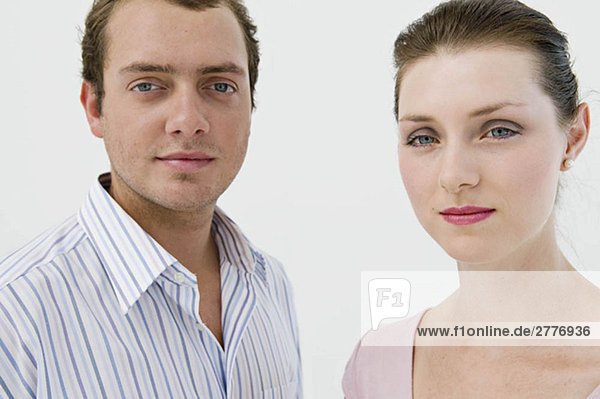 A head shot of a business couple.