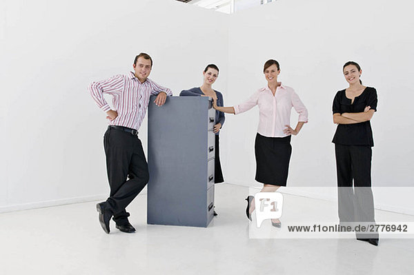 A business group with filing cabinet
