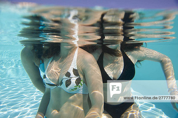 Girls in swimming pool