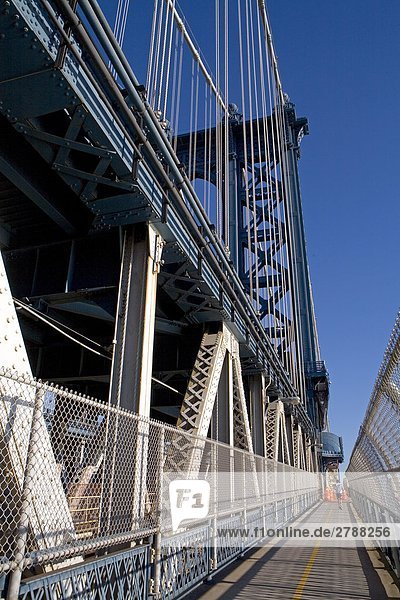 Person walking on bridge  Brooklyn Bridge  Manhattan  New York City  New York State  USA
