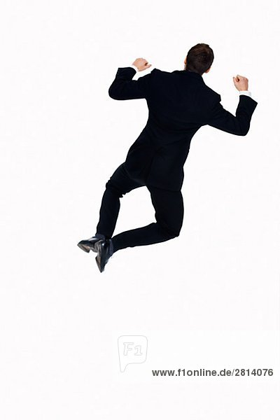 A man in a suit jumping Sweden
