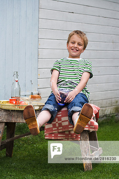 A boy having a snack Sweden.