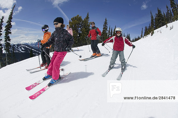 Family skiing together  Whistler Mountain  British Columbia  Canada.