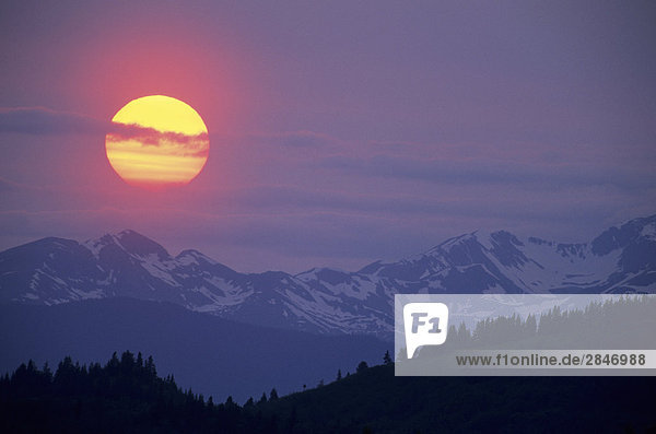 Sunset over mountain ridges  Bulkley Valley  British Columbia  Canada.