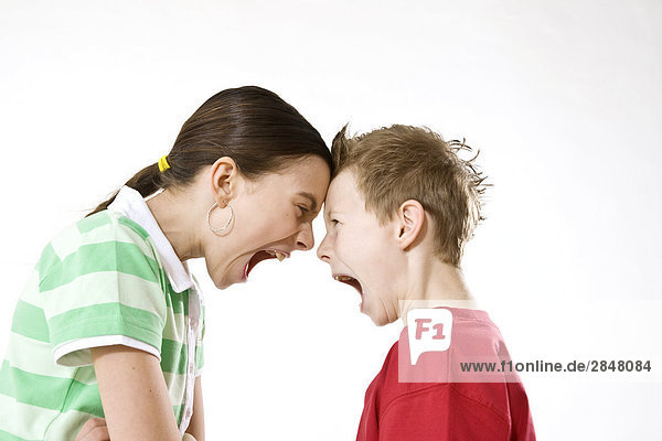Boy and his sister shouting over each other