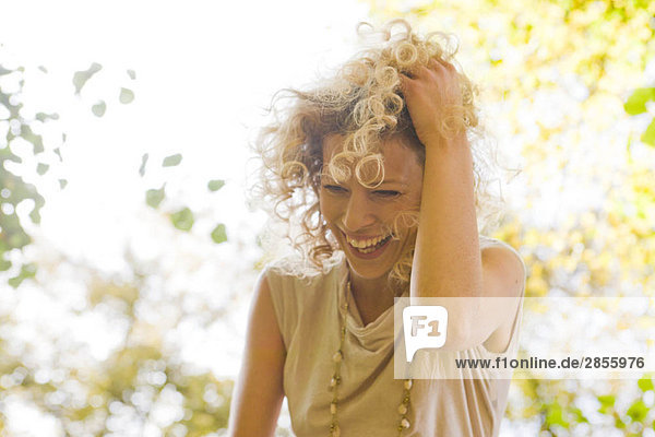 Woman laughing enjoying leisure time