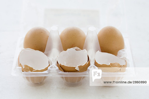 Eggs and Egg shells in egg box