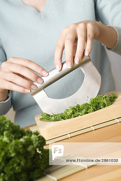 Person cutting parsley
