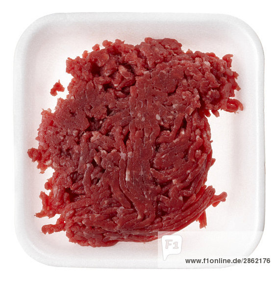 Raw ground meat in plastic box  elevated view