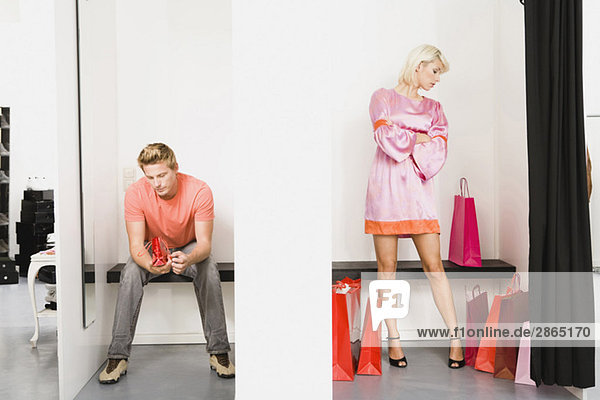 Couple in shop fitting room