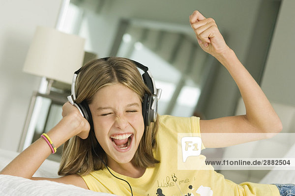 Girl listening to headphones