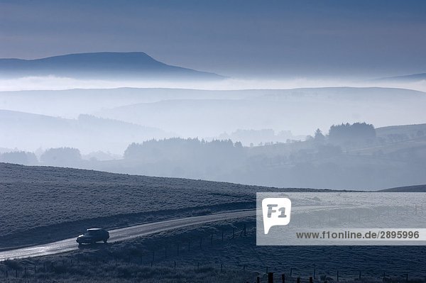 Car on country road  Brecon Beacons National Park  Great Britain  Wales  Powys