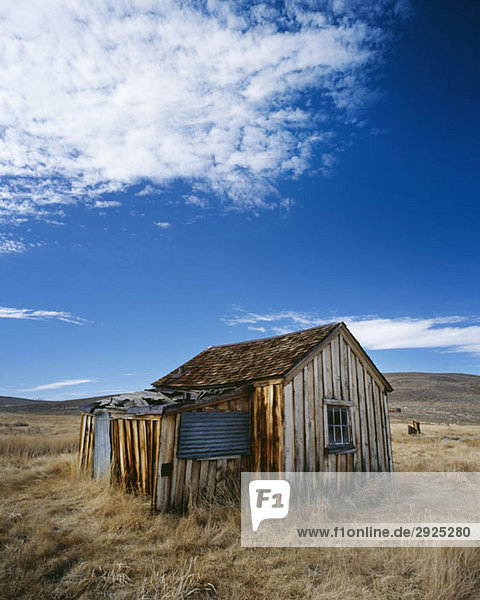 A wooden shack in a field  Bodie State Historic Park  California  USA