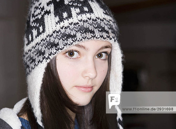 Girl  14 wearing hat