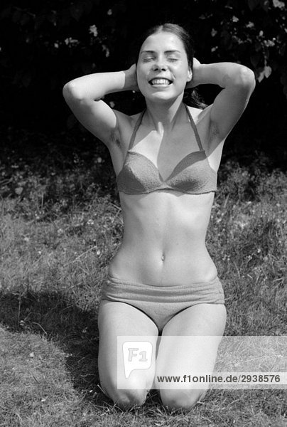 Seventies  black and white photo  people  young girl in a bikini  portrait  aged 18 to 22 years  Gaby  Gabi