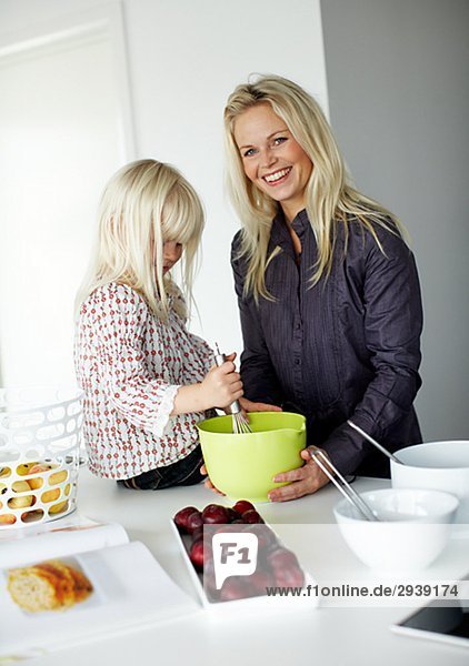 Mother and daughter in a kitchen Sweden.