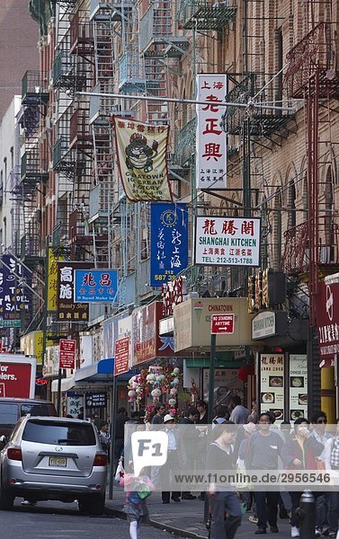 Busy shopping street in Chinatown  New York City  USA